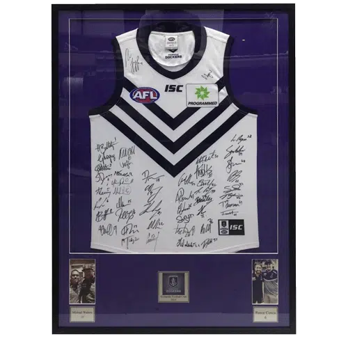 Framed Fremantle Dockers signed AFL jersey